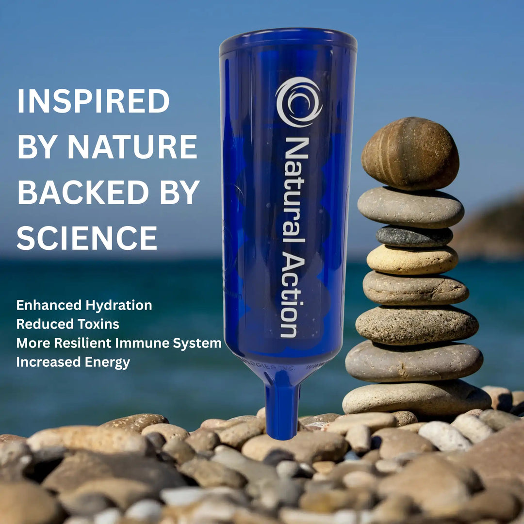 Blue Portable Unit with 'Natural Action' branding on a rocky beach with ocean view